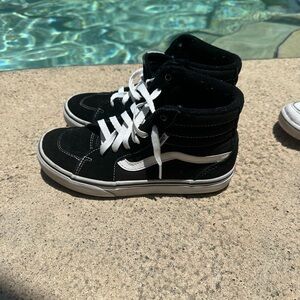 Girls size 4 Vans black and white shoes. Gently used, smoke free environment.
